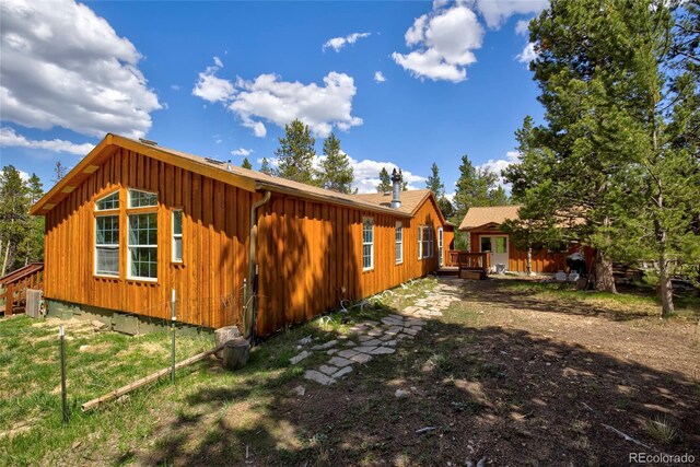 166 Ski Doo Rd, Fairplay, CO 80440 - view of side of property featuring board and batten siding and a wooden deck