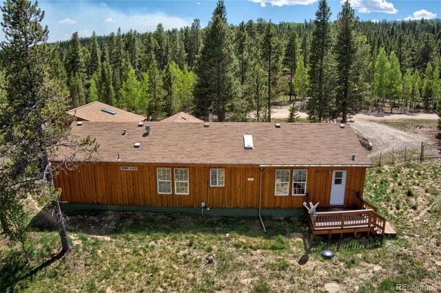 166 Ski Doo Rd, Fairplay, CO 80440 - rear view of property with a view of trees and a deck