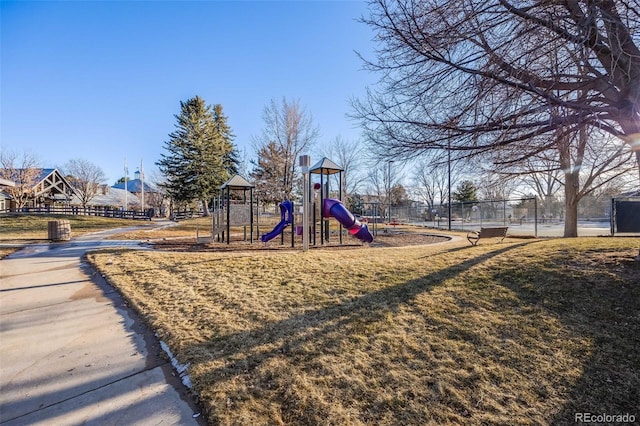 view of jungle gym featuring a yard