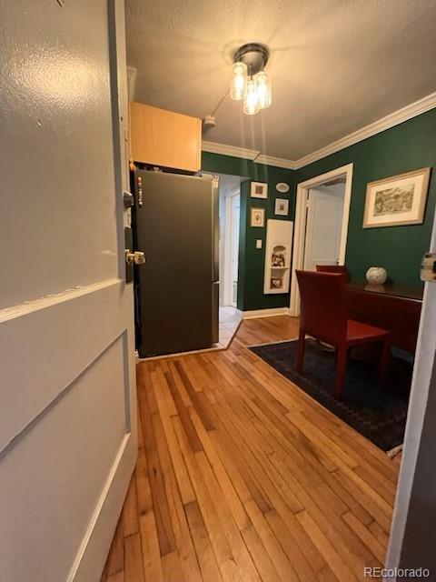 1024 E 14th Ave Unit 2, Denver, CO 80218 - home office with crown molding and light wood finished floors