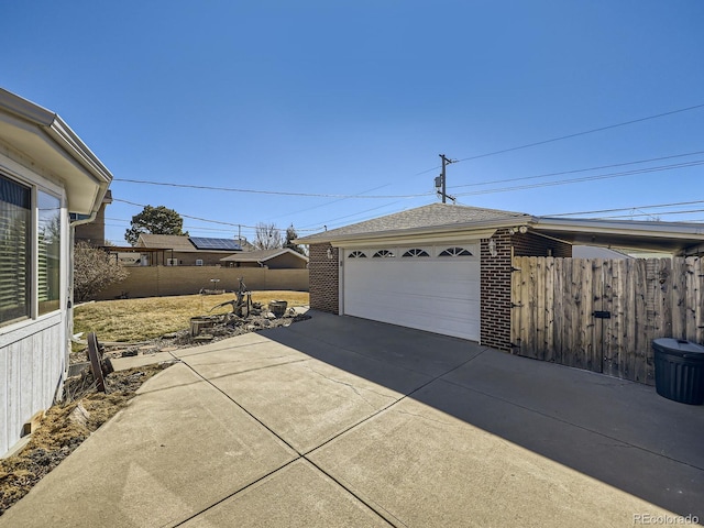 detached garage with fence