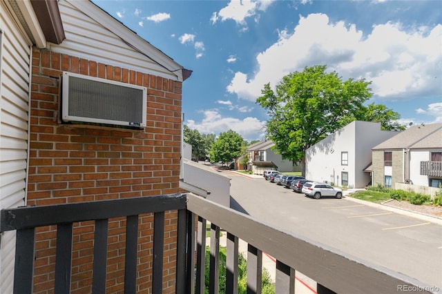 3550 S Harlan St Unit 214, Denver, CO 80235 - balcony featuring a residential view and a wall mounted AC