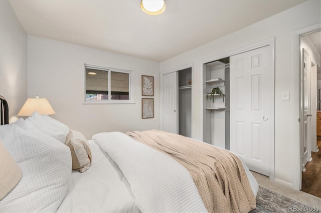 6290 Quail St, Arvada, CO 80004 - carpeted bedroom featuring two closets