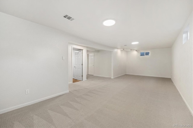 6290 Quail St, Arvada, CO 80004 - finished below grade area with light colored carpet and baseboards