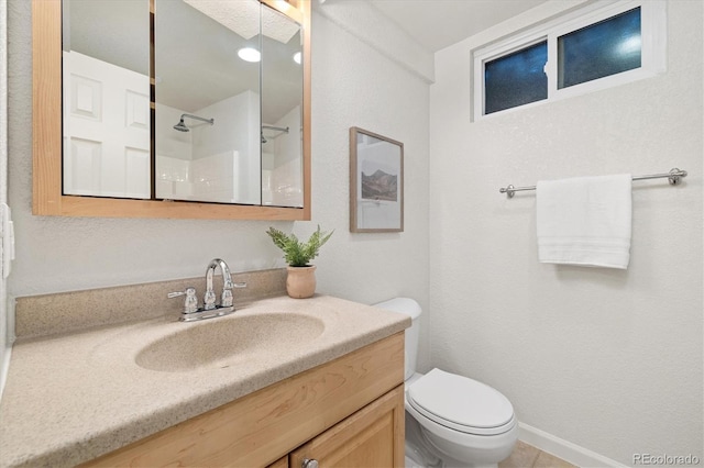 6290 Quail St, Arvada, CO 80004 - bathroom featuring vanity and a shower