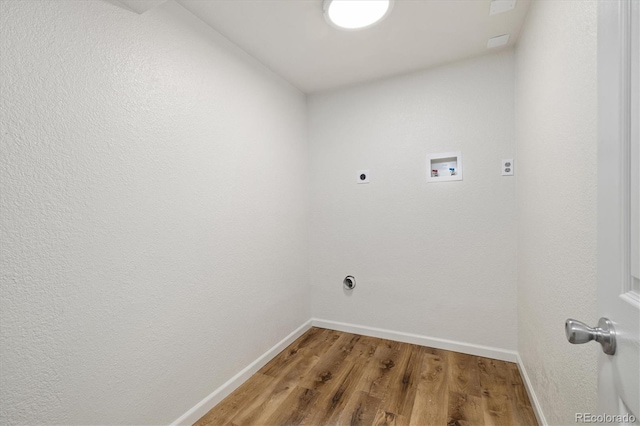 6290 Quail St, Arvada, CO 80004 - laundry room with electric dryer hookup, washer hookup, and light wood-type flooring