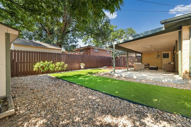 6290 Quail St, Arvada, CO 80004 - fenced backyard featuring a patio area and an outdoor living space