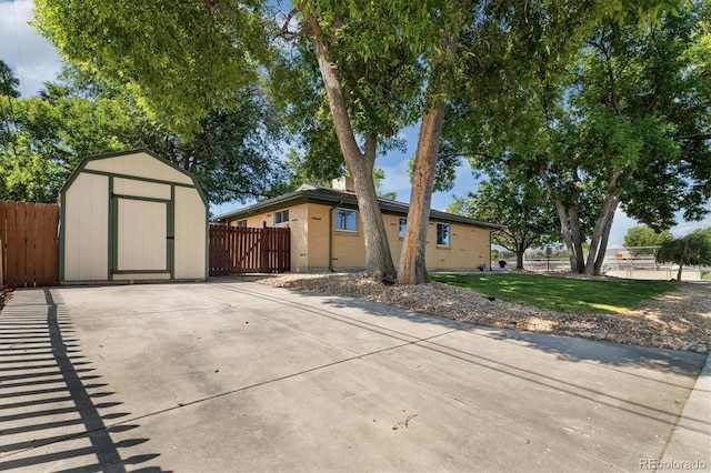 6290 Quail St, Arvada, CO 80004 - view of front facade featuring a storage unit