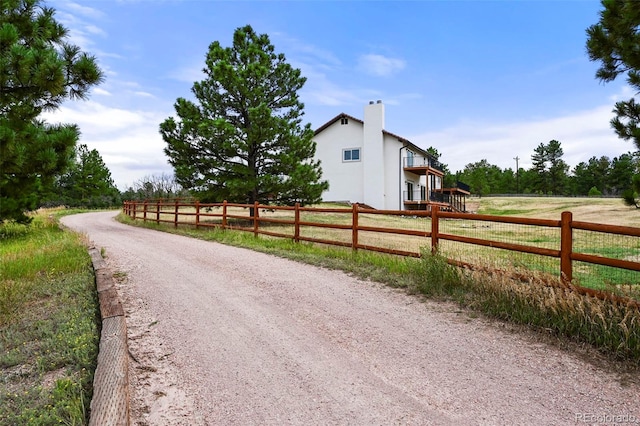 view of road with driveway