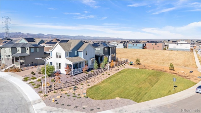 aerial view with a mountain view and a residential view