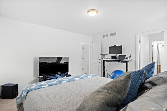 carpeted bedroom with visible vents