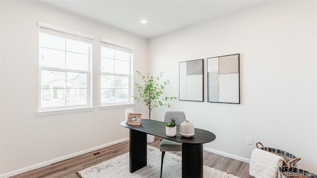 17850 W 94th Dr, Arvada, CO 80007 - home office featuring wood finished floors, baseboards, and recessed lighting