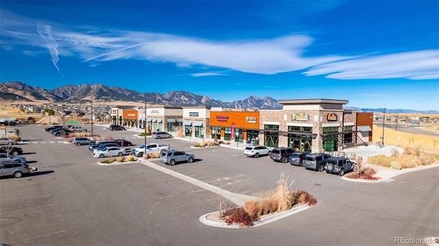 17850 W 94th Dr, Arvada, CO 80007 - view of commercial location featuring uncovered parking and a mountain view