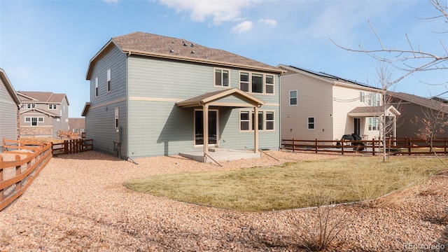 17850 W 94th Dr, Arvada, CO 80007 - rear view of property with a patio area