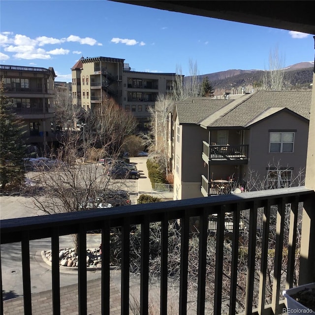 balcony featuring a mountain view