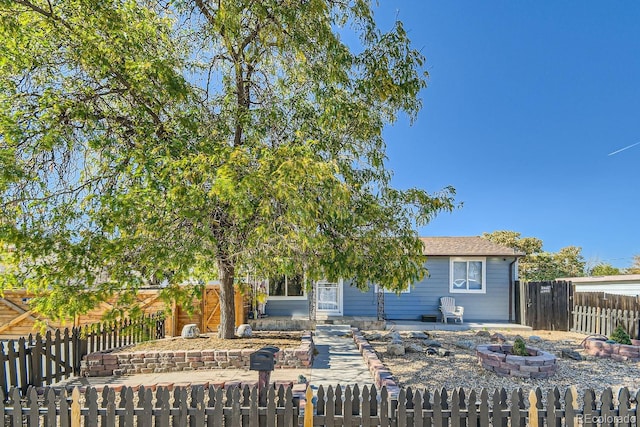 view of front of home featuring a patio