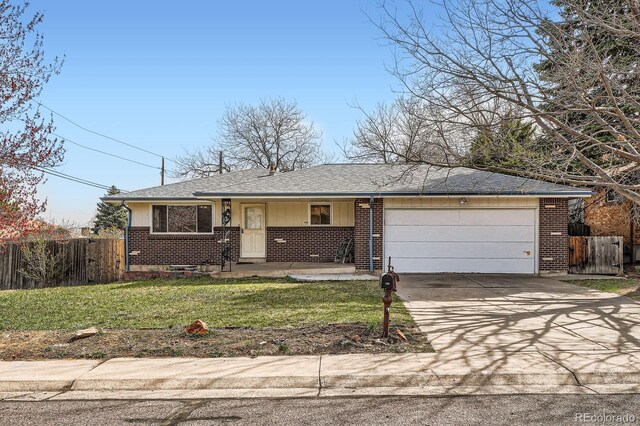 single story home with brick siding, concrete driveway, a garage, and fence