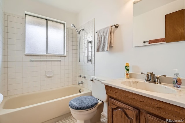full bath featuring tub / shower combination, toilet, and vanity