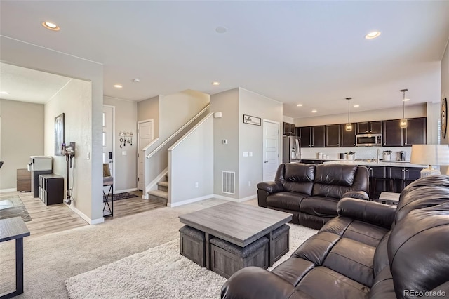 living room with light carpet