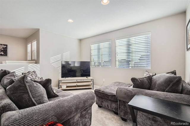 living room with light colored carpet