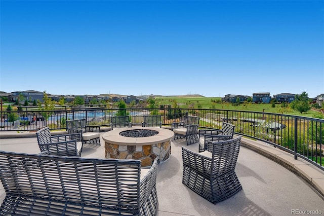 view of patio featuring a fire pit