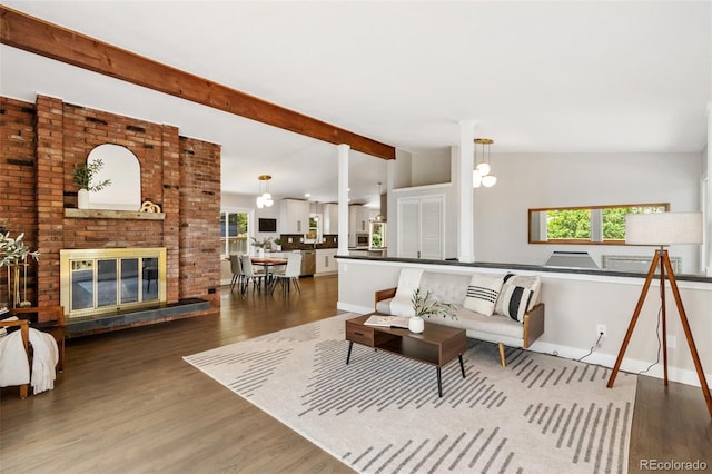 2434 Virgo Dr, Colorado Springs, CO 80906 - living area with wood finished floors and a fireplace