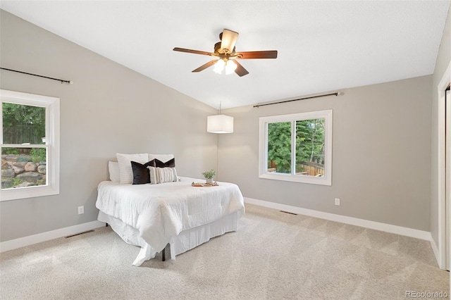 2434 Virgo Dr, Colorado Springs, CO 80906 - bedroom with lofted ceiling, light colored carpet, and ceiling fan