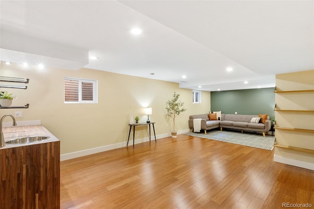 2434 Virgo Dr, Colorado Springs, CO 80906 - living area with light wood finished floors and recessed lighting