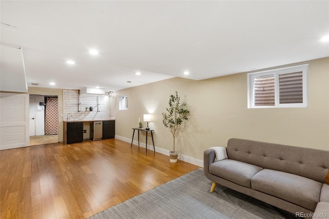 2434 Virgo Dr, Colorado Springs, CO 80906 - living area with light wood-type flooring and recessed lighting