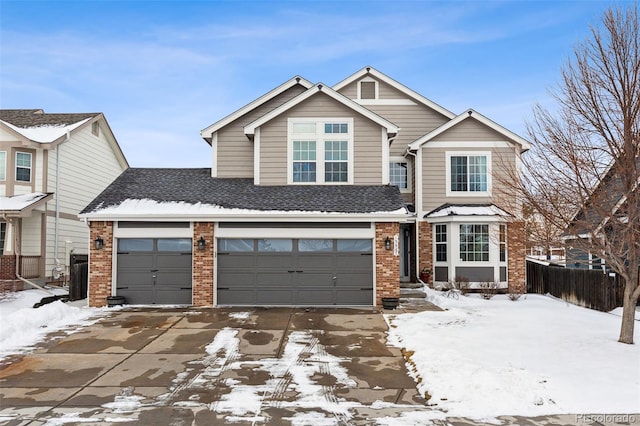 view of front of property with a garage