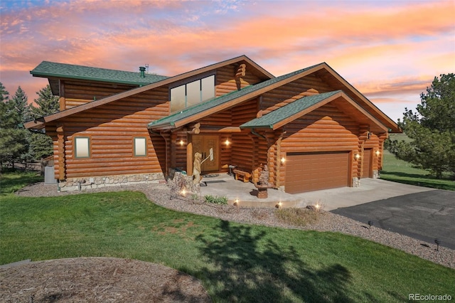 3557 Palmer Ridge Dr, Parker, CO 80134 - log-style house featuring log exterior, a yard, driveway, roof with shingles, and a garage