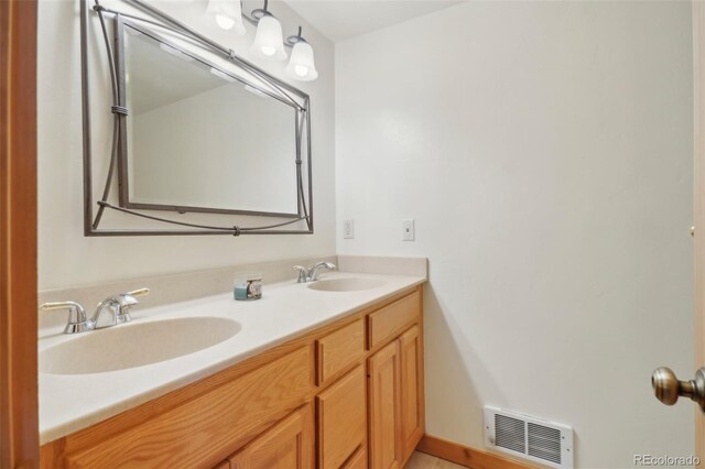3557 Palmer Ridge Dr, Parker, CO 80134 - bathroom featuring double vanity