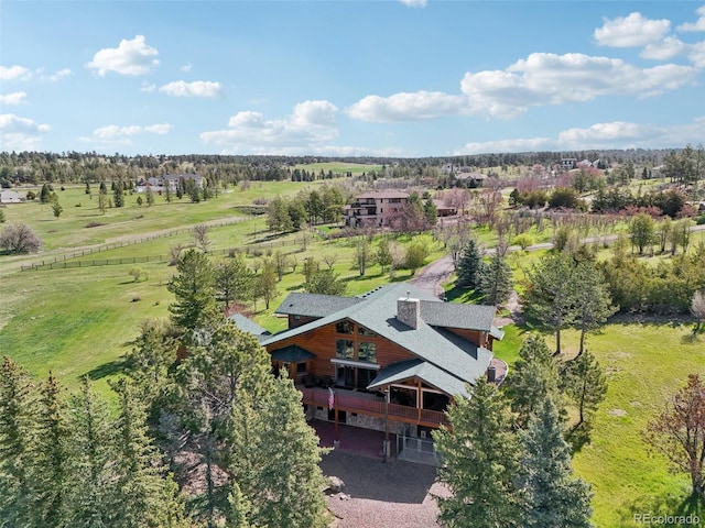 3557 Palmer Ridge Dr, Parker, CO 80134 - view of subject property with a tree filled landscape