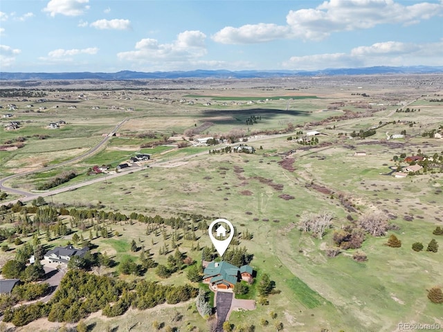 3557 Palmer Ridge Dr, Parker, CO 80134 - aerial view of property and surrounding area with a mountain backdrop and rural landscape