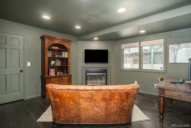 40 S Dexter St, Denver, CO 80246 - living area with dark wood-style floors, recessed lighting, a glass covered fireplace, and a textured wall