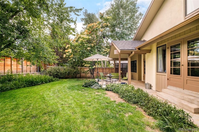 40 S Dexter St, Denver, CO 80246 - fenced backyard with a patio area