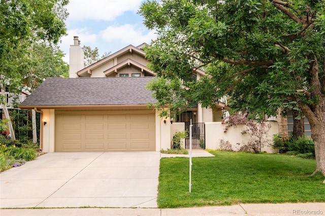 40 S Dexter St, Denver, CO 80246 - view of front of property with driveway, a garage, stucco siding, and a chimney