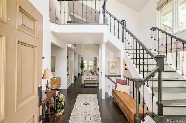 40 S Dexter St, Denver, CO 80246 - foyer entrance with a high ceiling, dark wood-style floors, and stairs