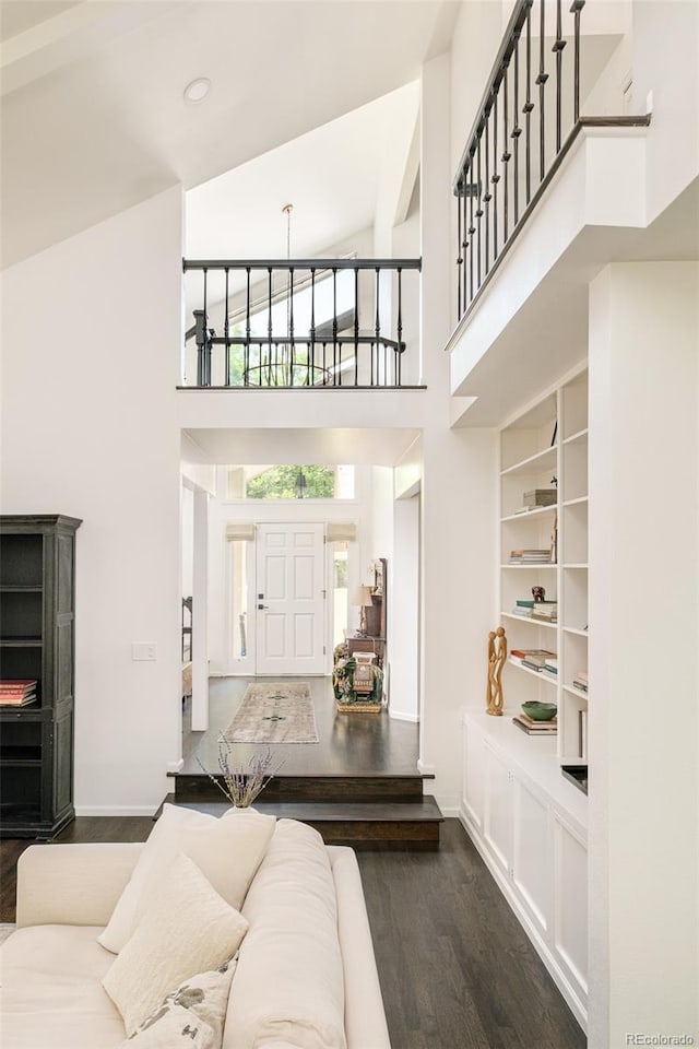 40 S Dexter St, Denver, CO 80246 - living area featuring a high ceiling and dark wood finished floors