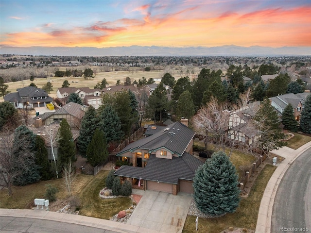 aerial view with a mountain view and a residential view