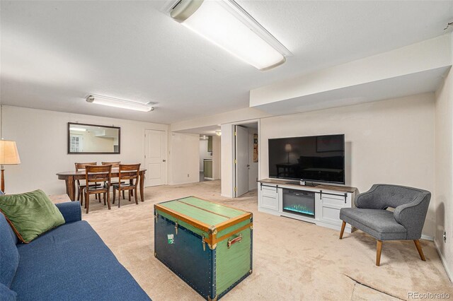 6235 W Floyd Ave, Denver, CO 80227 - living room featuring light carpet