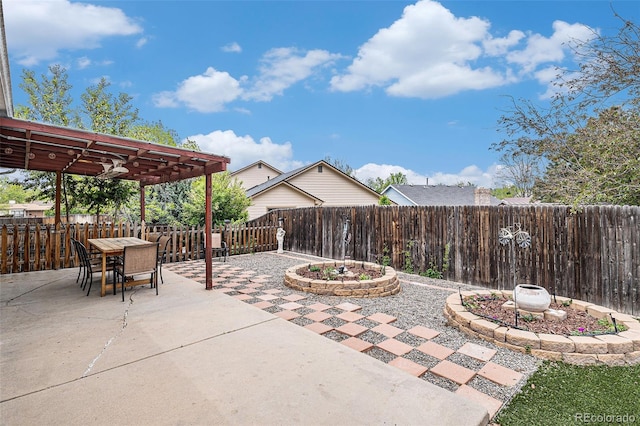 6235 W Floyd Ave, Denver, CO 80227 - fenced backyard with a patio area, a pergola, and outdoor dining space