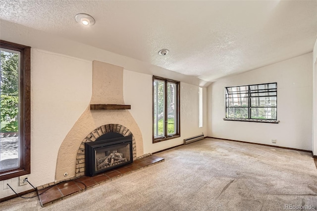 4490 Balsam St, Wheat Ridge, CO 80033 - unfurnished living room featuring a textured ceiling, baseboard heating, healthy amount of natural light, carpet flooring, and lofted ceiling