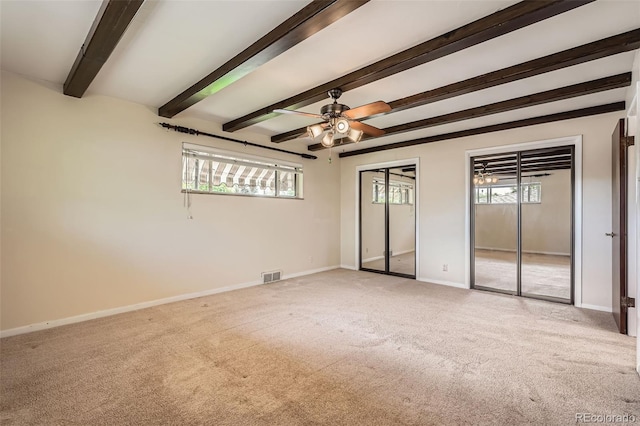 4490 Balsam St, Wheat Ridge, CO 80033 - empty room with beamed ceiling, light carpet, baseboards, and ceiling fan