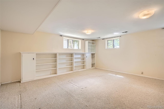 4490 Balsam St, Wheat Ridge, CO 80033 - basement featuring baseboards and light carpet