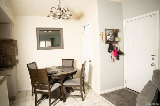 1358 S Irving St Unit A9, Denver, CO 80219 - dining space with a chandelier and baseboards