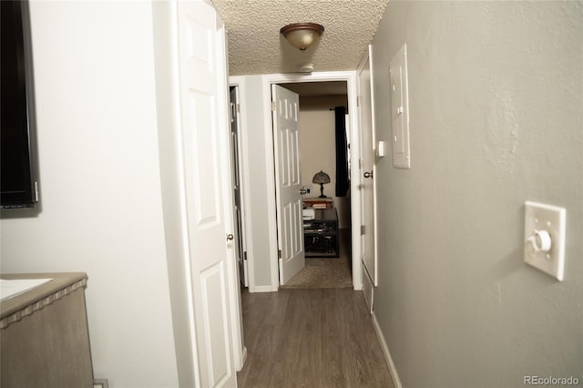 1358 S Irving St Unit A9, Denver, CO 80219 - hall with dark wood-style flooring and a textured ceiling