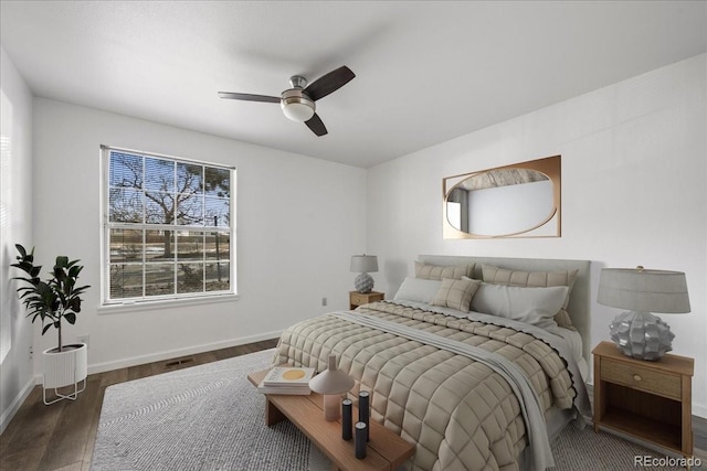 bedroom featuring ceiling fan and dark hardwood / wood-style flooring