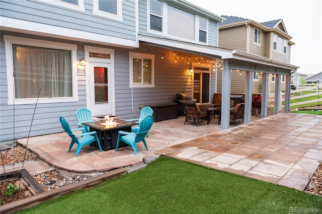 3902 Eagle Tail Ln, Castle Rock, CO 80104 - view of patio / terrace featuring an outdoor fire pit