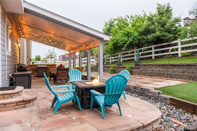 3902 Eagle Tail Ln, Castle Rock, CO 80104 - view of patio / terrace featuring a fire pit